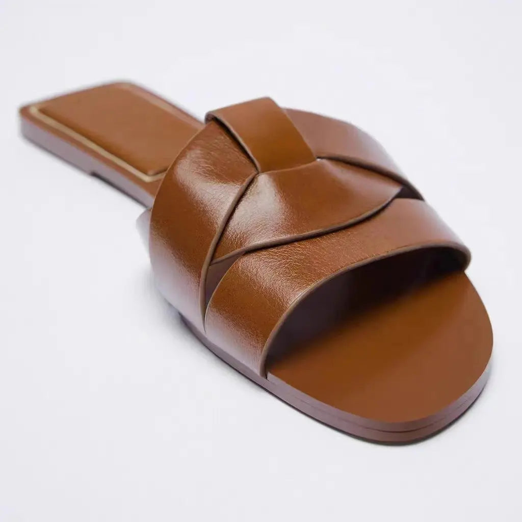 Three-quarter view of Brown Elysian Sandals