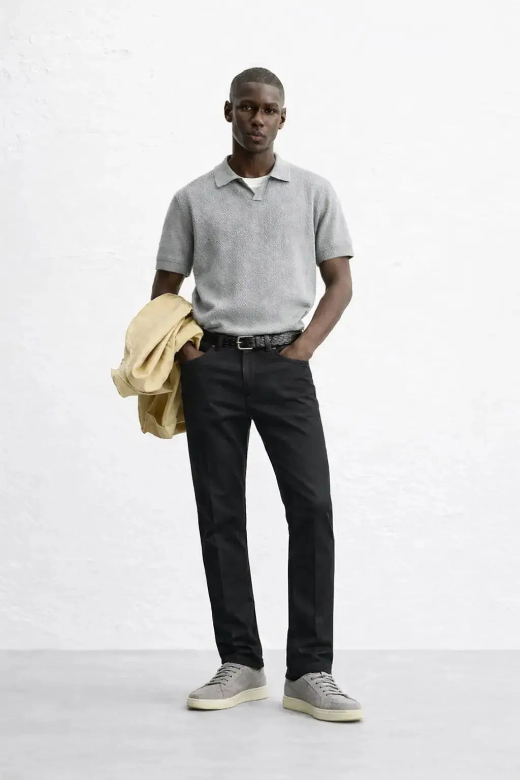 Fenice Polo-shirt shown in a lifestyle setting, alternate view