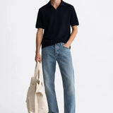 Fenice Polo-shirt shown in a lifestyle setting, cropped view
