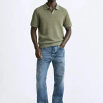 Fenice Polo-shirt shown in a lifestyle setting, full length view