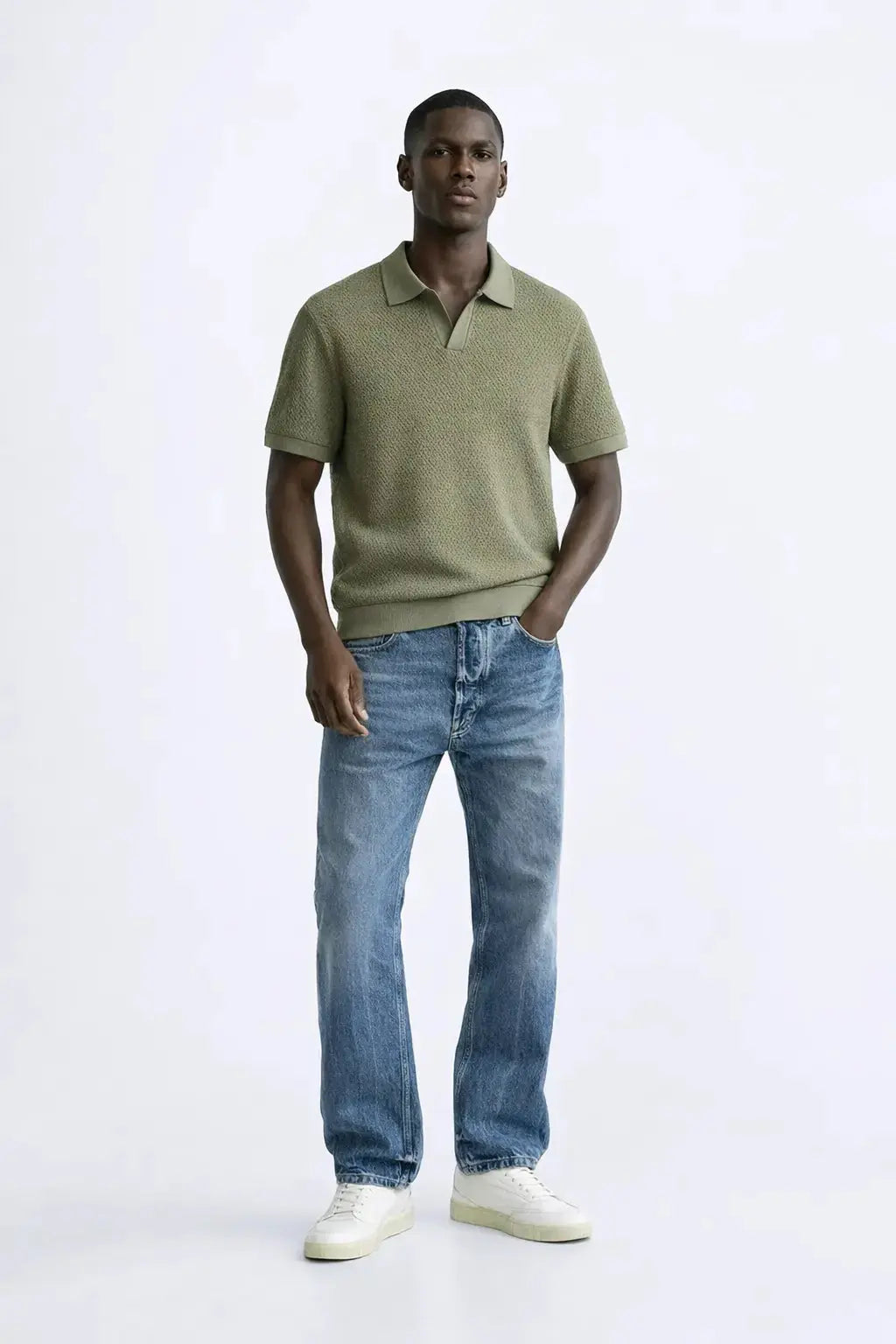 Fenice Polo-shirt shown in a lifestyle setting, full length view