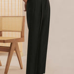Fernache Italian Trousers shown in a lifestyle setting, side angle view