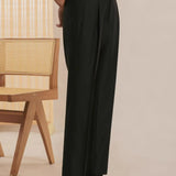 Fernache Italian Trousers shown in a lifestyle setting, side angle view