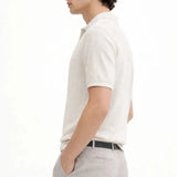 Fernache Polo Shirt shown in a lifestyle setting, alternate view