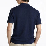 Fernache Polo Shirt shown in a lifestyle setting, full length view