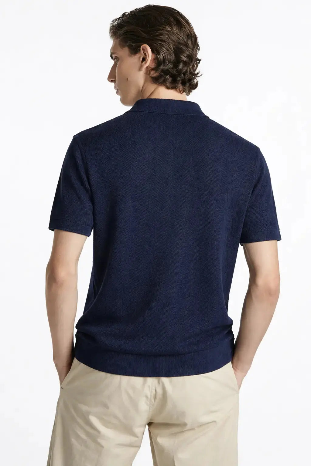 Fernache Polo Shirt shown in a lifestyle setting, full length view