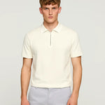White Fernache Polo Shirt shown in a lifestyle setting