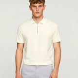 White Fernache Polo Shirt shown in a lifestyle setting