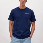 WALL STREET t-shirt C1 shown in a lifestyle setting