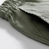 Close-up detail of Linen Pantalon Pants, hardware detail