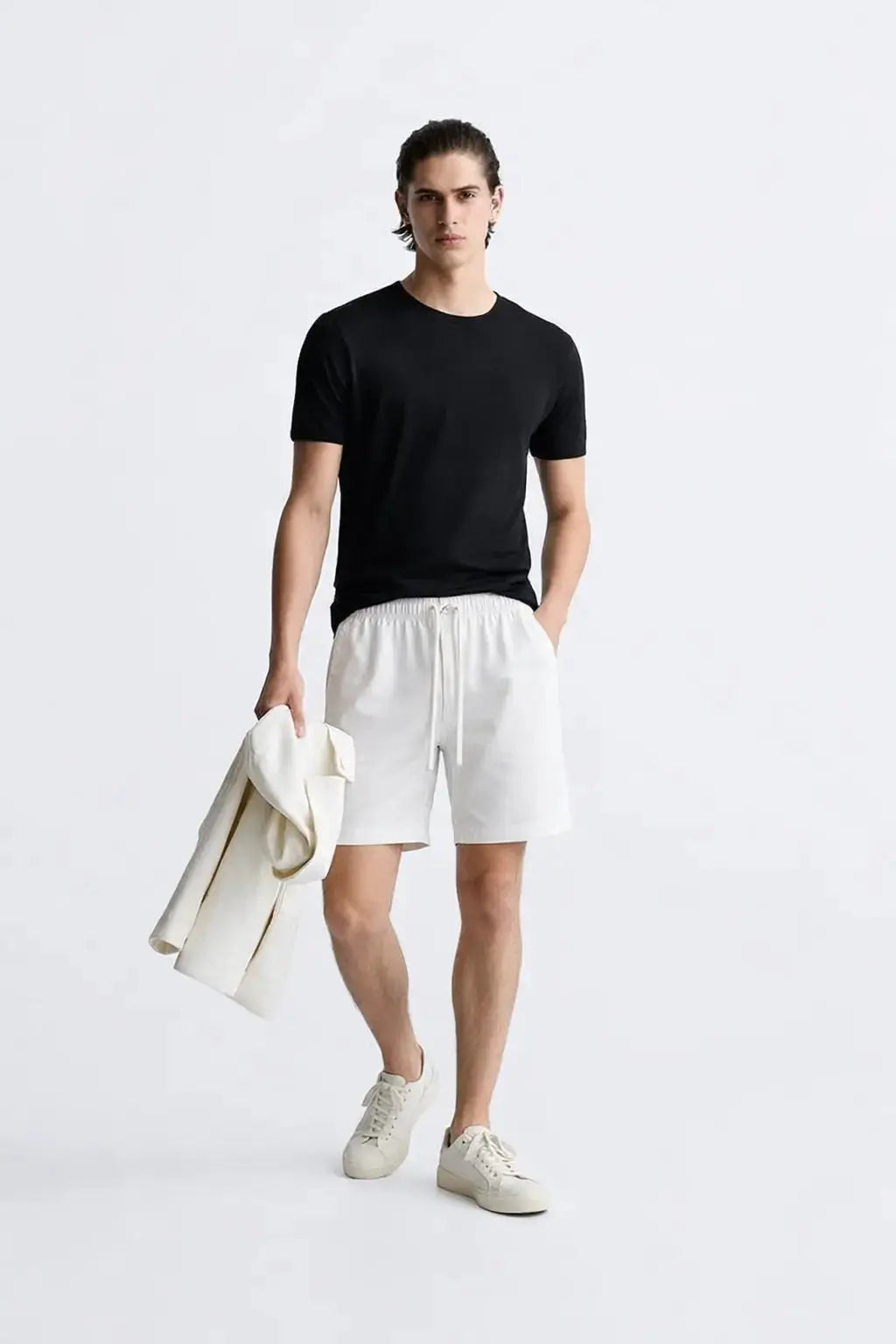 Fez Linen Shorts shown in a lifestyle setting, alternate view