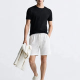 Fez Linen Shorts shown in a lifestyle setting, alternate view
