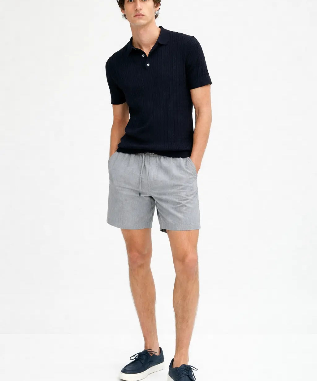 Fez Linen Shorts shown in a lifestyle setting