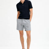 Fez Linen Shorts shown in a lifestyle setting