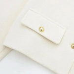 Close-up detail of Golden Button Jacket Coat