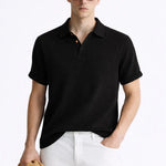 Hampton Breeze Polo shown in a lifestyle setting, side angle view
