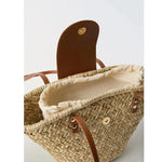 Open Isla Straw Bag showing the interior, alternate view
