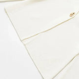 Close-up detail of Ivory Cardigan, fabric detail