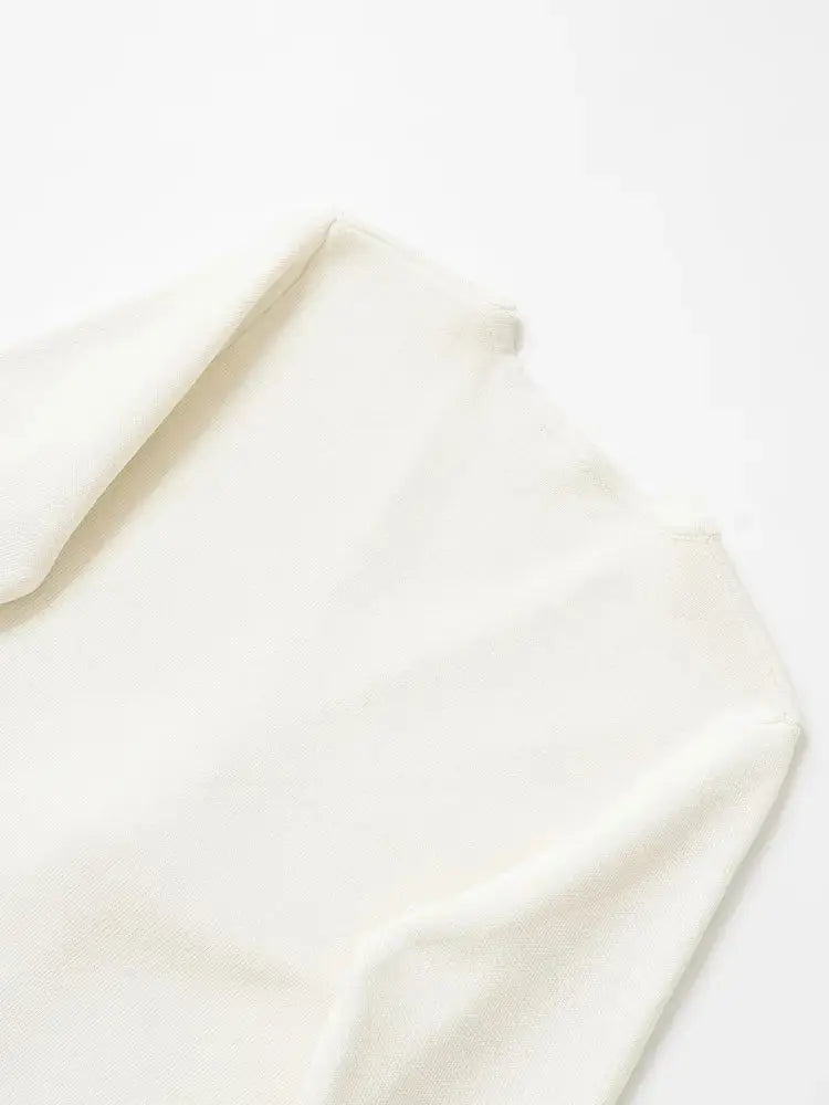 Close-up detail of Ivory Cardigan, hardware detail
