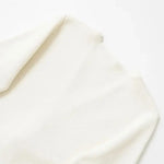 Close-up detail of Ivory Cardigan, hardware detail