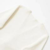 Close-up detail of Ivory Cardigan, hardware detail