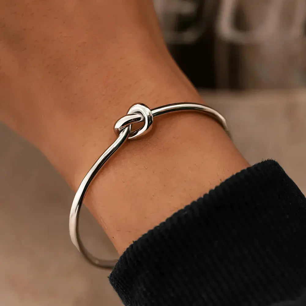 Golden Tie Bracelet shown in a lifestyle setting