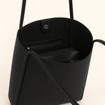 Open Leather button bag showing the interior, alternate view