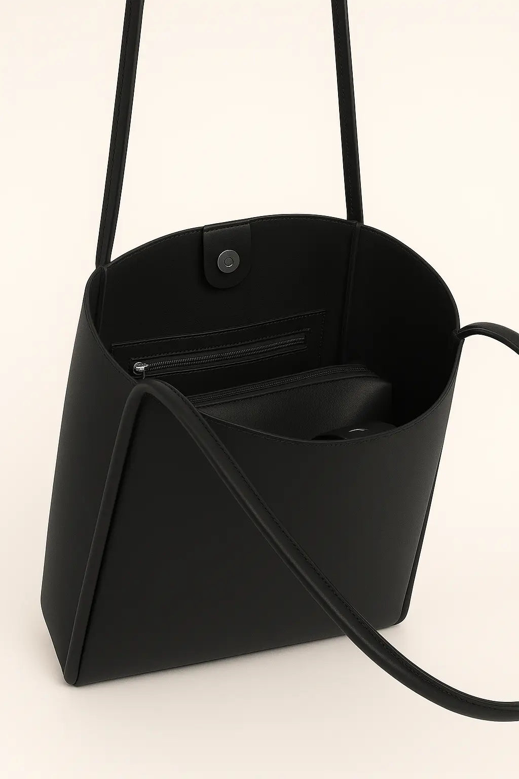 Open Leather button bag showing the interior, alternate view