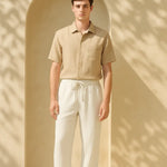 Linen Loose Pants shown in a lifestyle setting, cropped view