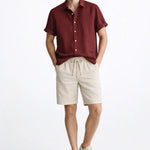 Linen Rayon Blend Button Up Shirt & Linen Drawstring Shorts shown in a lifestyle setting, full length view
