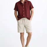 Linen Rayon Blend Button Up Shirt & Linen Drawstring Shorts shown in a lifestyle setting, full length view