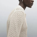 Liora Knit shown in a lifestyle setting, cropped view