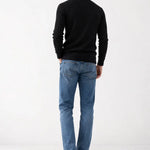 LIVIGNO High Collar Half Zip Sweater shown in a lifestyle setting, alternate view