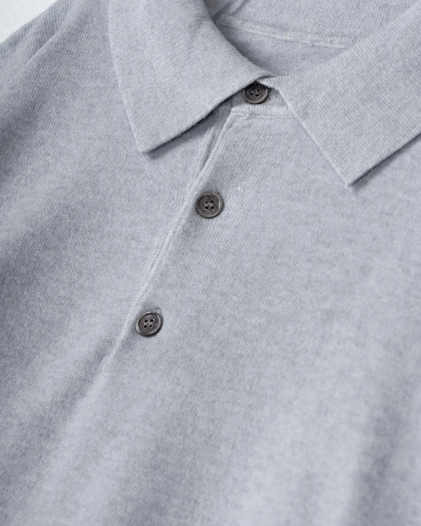 Close-up detail of Fernache Old Money Wool Fine Polo, hardware detail