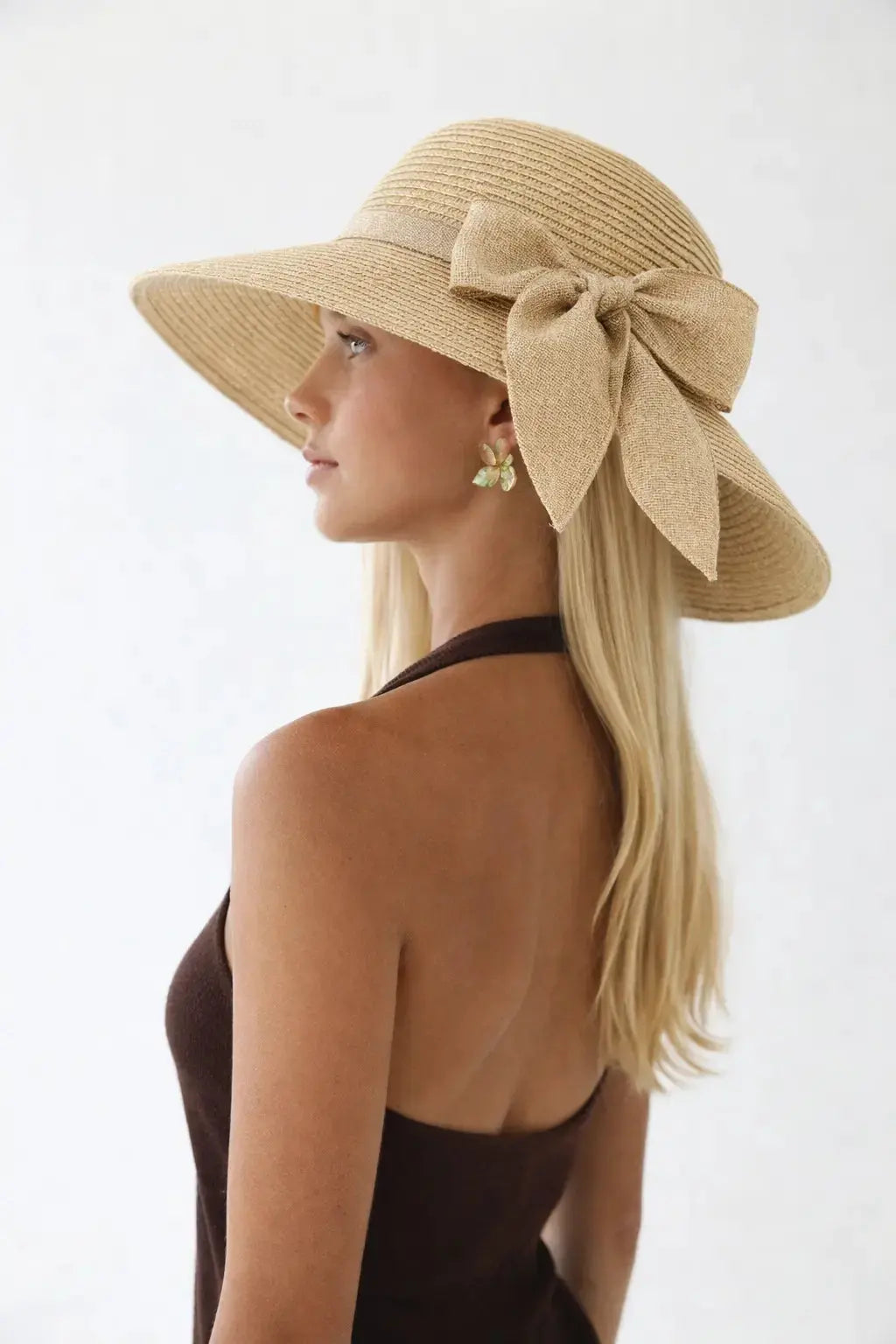 Luce di Capri Hat shown in a lifestyle setting, cropped view