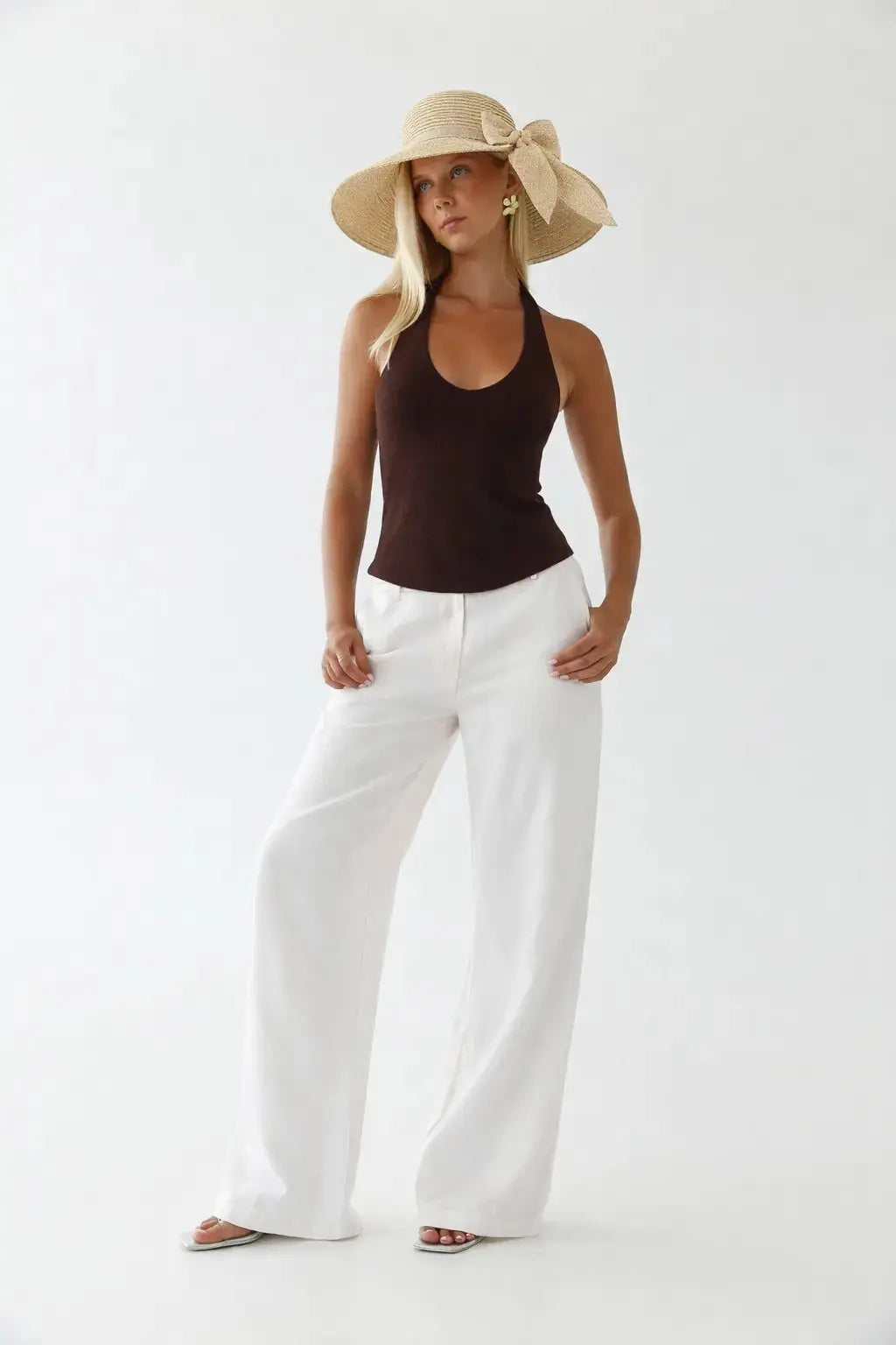 Luce di Capri Hat shown in a lifestyle setting, side angle view