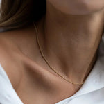 Luna Dots Necklace shown in a lifestyle setting, alternate view