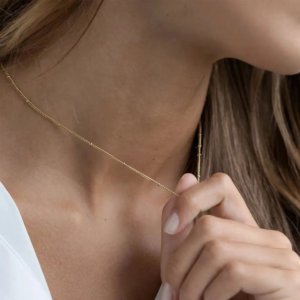 Luna Dots Necklace shown in a lifestyle setting, full length view