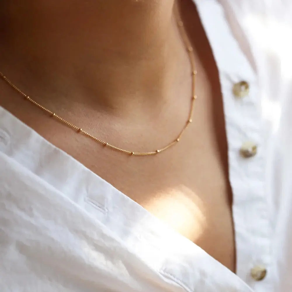 Luna Dots Necklace shown in a lifestyle setting