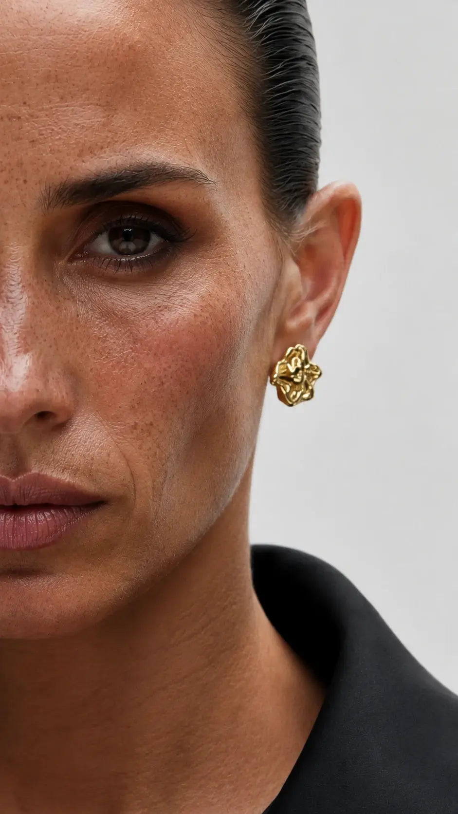 Luna Fern Earrings shown in a lifestyle setting, cropped view