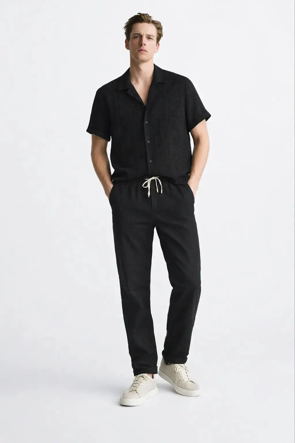 Malé - Short-Sleeved Set shown in a lifestyle setting, cropped view