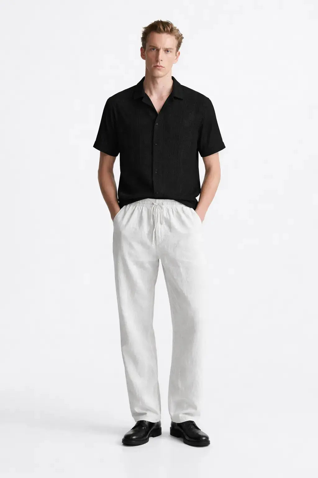 Malé - Short-Sleeved Set shown in a lifestyle setting, side angle view