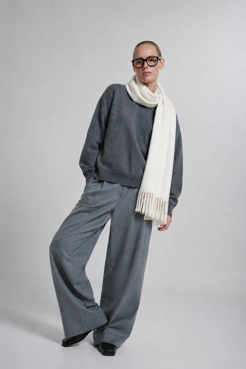 Marcelline Scarf shown in a lifestyle setting, back angle view