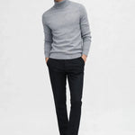 Merino Royal Turtleneck shown in a lifestyle setting, full length view