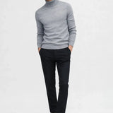 Merino Royal Turtleneck shown in a lifestyle setting, full length view