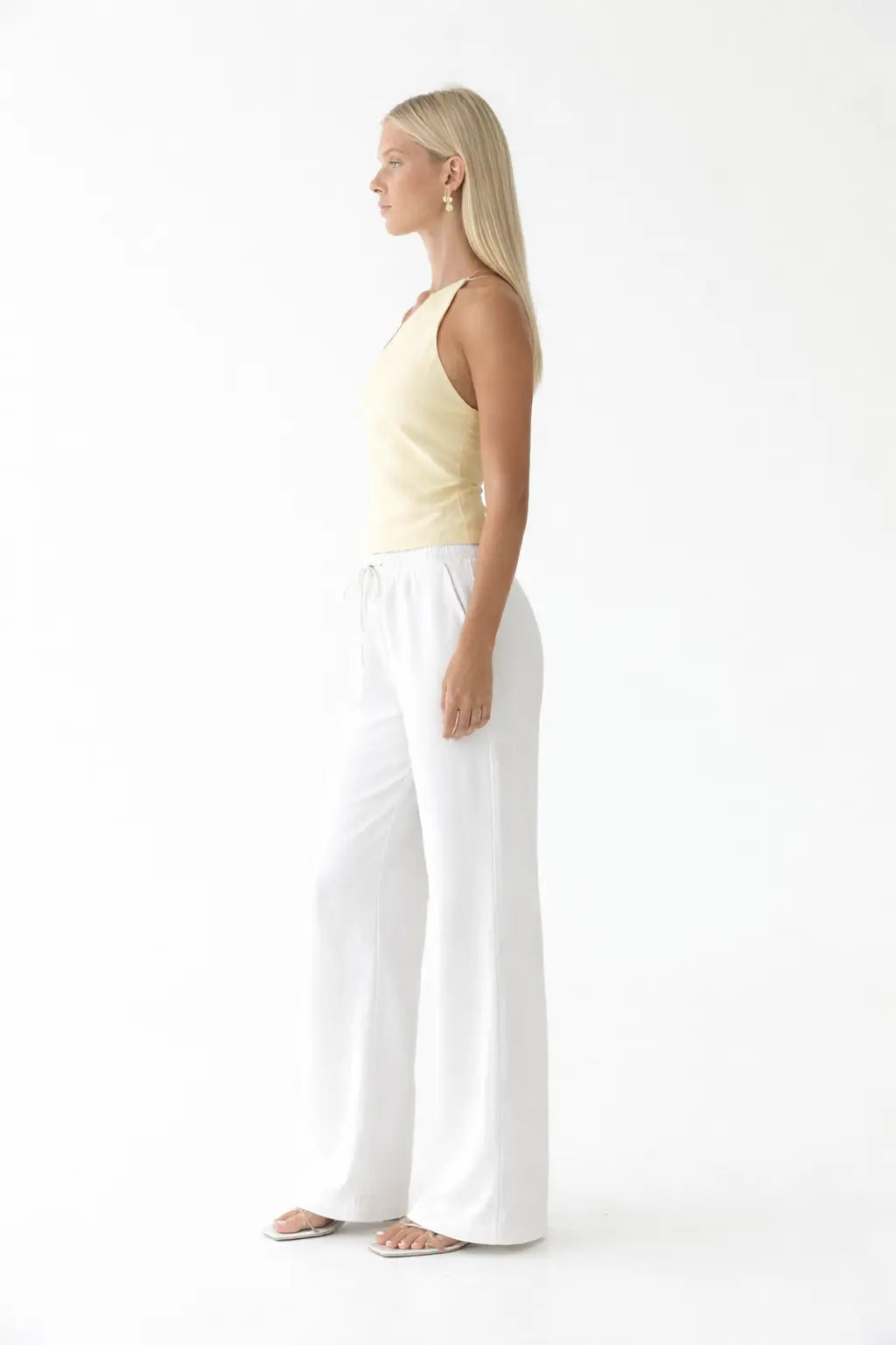 Mira Coast Pants shown in a lifestyle setting, alternate view