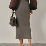 Nina Skirt shown in a lifestyle setting, full length view