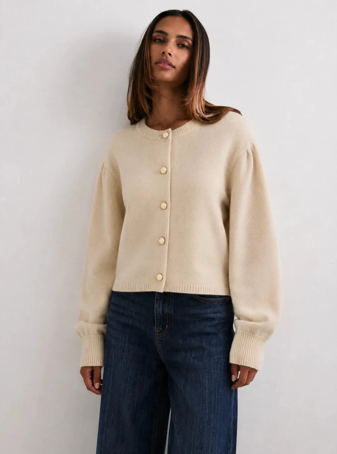 Nivelle Cardigan shown in a lifestyle setting