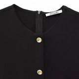 Close-up detail of Noir Silhouette Dress