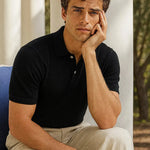 Black Cotton Polo Shirt shown in a lifestyle setting